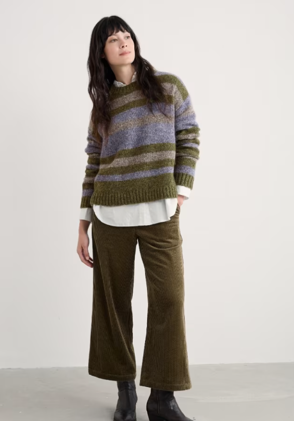 Seasalt Painter Striped Jumper Contains Mohair Carvannel Laurel Mix seasalt clothing womens striped warm jumper Person wearing a striped sweater and wide-leg pants against a plain background