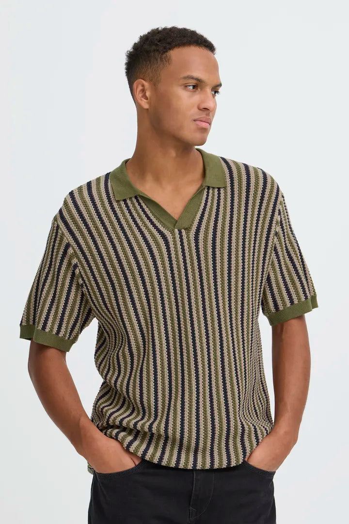 Blend Carly Polo Knit Top Winter Moss mens Smart Stylish Top from Blend. Colour: Winter Moss Material: 100% Cotton Man wearing a patterned shirt with green collar and trim on a white background