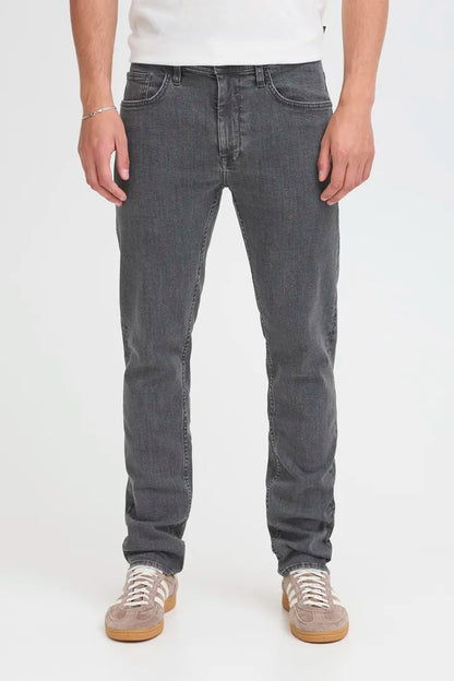 Blend Jeans BHRWister Denim Grey Regular/Slim Fit jeans for men with a Regular Waist and Zip fly. Colour: Rosin Material: 81% Cotton, 17% Polyester & 2% Elastane Person wearing gray jeans on a white background