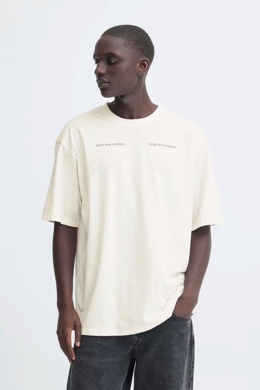 Blend Keaton Backprint T-shirt Snow White men's Casual T-shirt by Blend. Colour: Snow White Material: 100% Cotton Person wearing a beige t-shirt with text on a white background