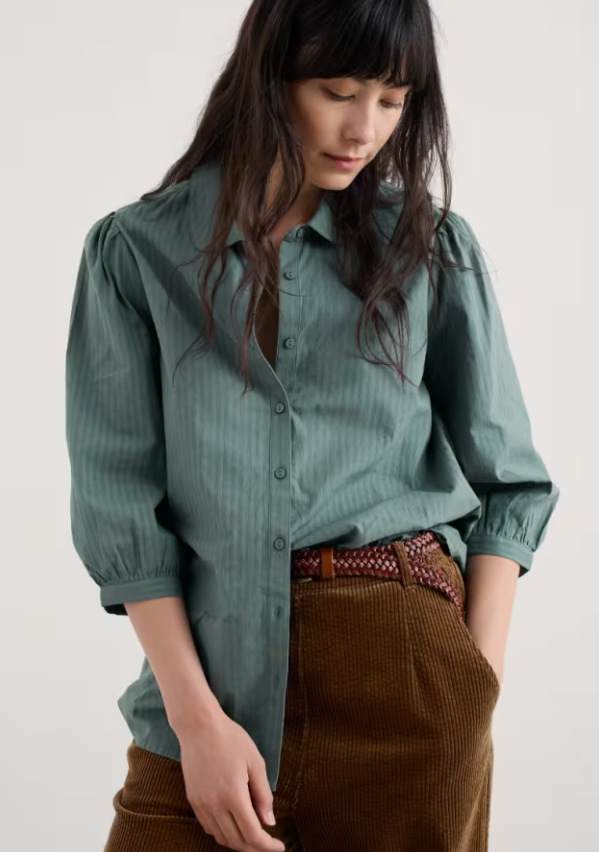 Seasalt Hope Cottage Organic Cotton Check Blouse Cliff Womens Shirt Seasalt Clothing  Woman wearing a green shirt and brown pants against a plain background