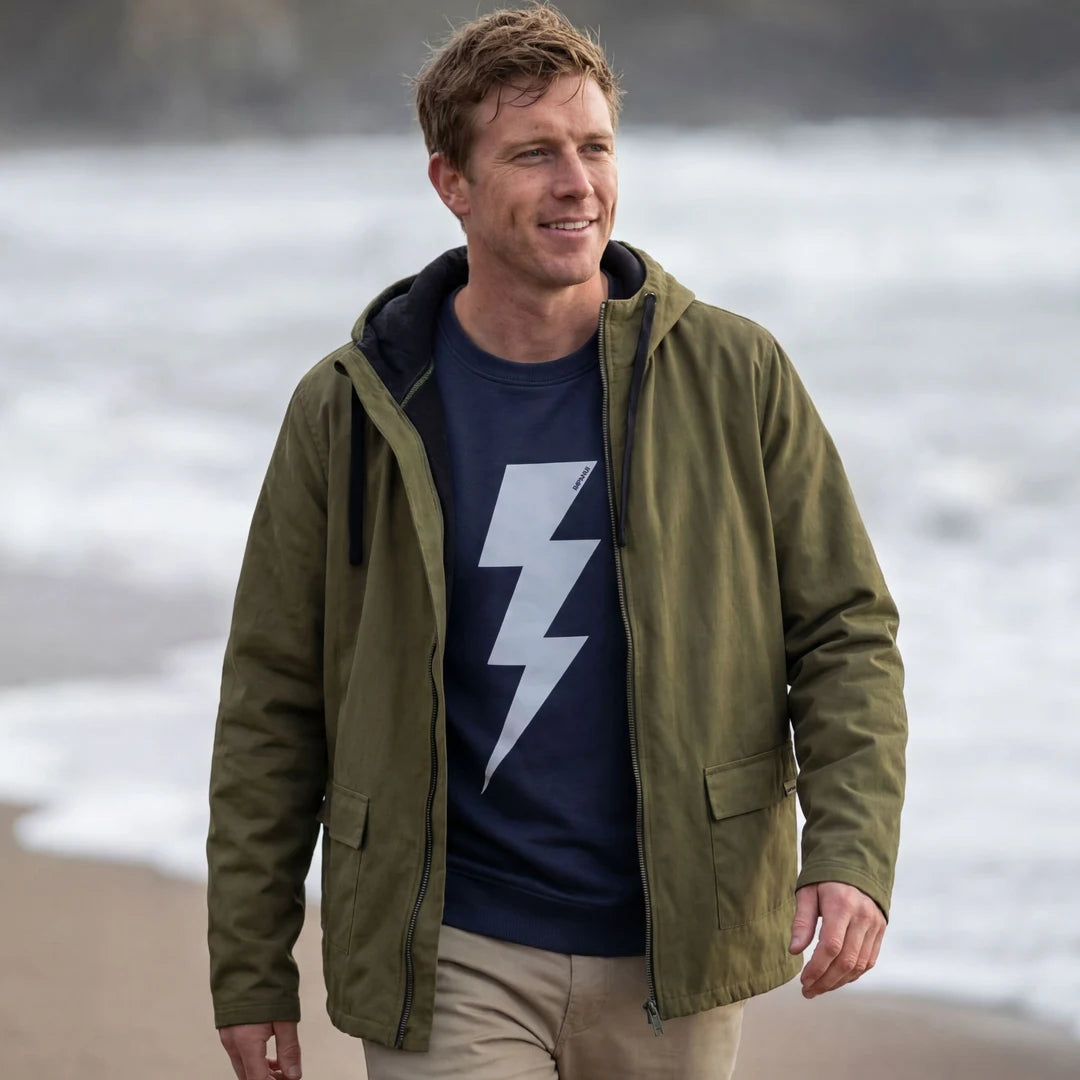 Rapanui Men's Fleece Lined Raincoat Khaki. Water resistant with PFC-Free coating made from Durable organic cotton canvas outer that's Fully lined with organic cotton fleece. Certified Organic Cotton Canvas Full Zip Jacket with PFC-free water resistant coating that's Hand wash only with Adjustable hood Colour: Khaki Material: Certified Organic Cotton t-shirt, 210g/m2