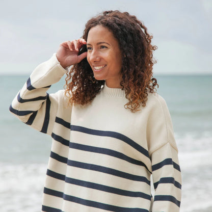 Rapanui Oversized Striped Knitted Jumper Navy & Ecru Stripe. Womens Oversized Striped Knitted Jumper Made in a renewable energy powered factory audited for a wide range of social and sustainability criteria Not tested on animals Wash cool, flat dry Colour: Navy & Ecru Stripe Material: Organic Cotton Stripe Knit Jumper