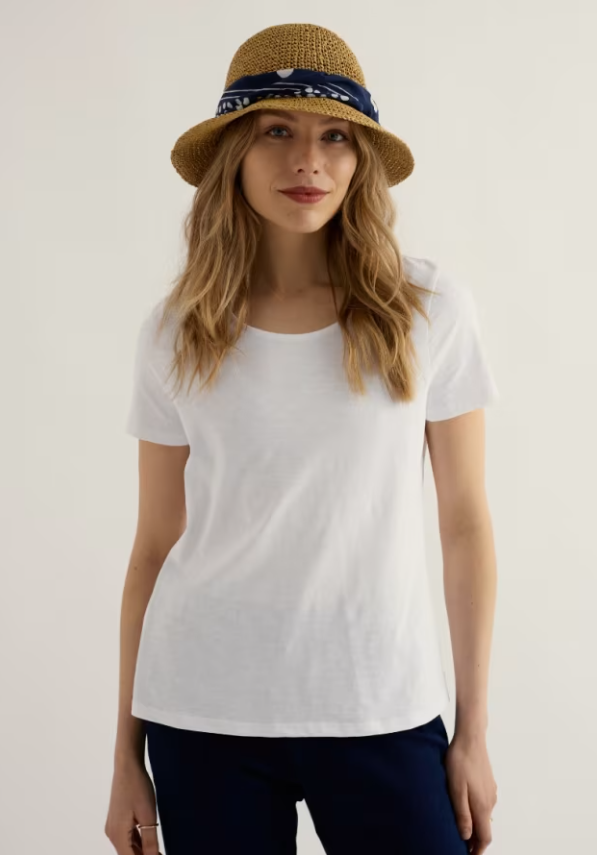 Seasalt Camerance T-Shirt Salt womens Easy fit with Scoop neck and Certified organic to Global Organic Textile Standards (GOTS) by Soil Association Certification GOTS-11394+Machine Wash 30C Colour: Salt Material: 100% Organic Cotton Woman wearing a white t-shirt and straw hat with a bandana on a plain background