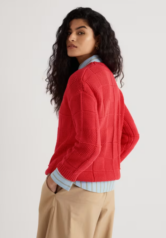 Seasalt Hedge Rock Mixed Stitch Crew Neck Jumper Cayenne women's Relaxed fit with a Crew neck that's Ribbed hem and cuffs and Ribbed neckline with 3 gauge knit and is Machine Wash 30C Colour: Cayenne Material: 99% Organic Cotton & 1% Elastane Woman wearing a red sweater over a light blue shirt with beige pants on a white background