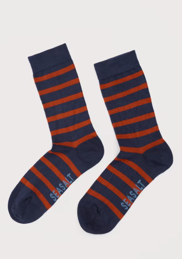 Seasalt Men's Sailor Socks Breton Dusty Copper bamboo socks Material: 80% Bamboo, 19% Polyamide & 1% Elastane Size: UK 7-11 Pair of navy and red striped socks on a light gray background