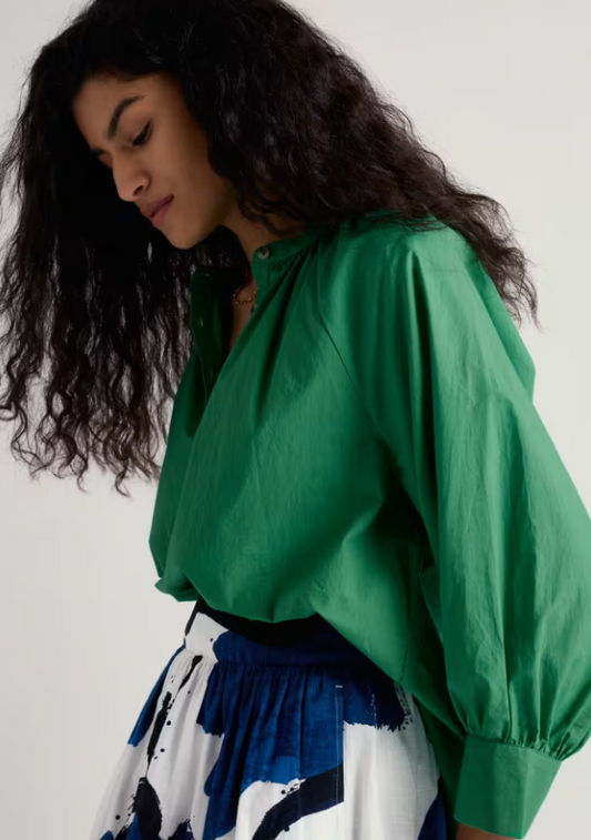 Seasalt Moor Grass A-Line Shirt Spring Green womens A-line with Round neck and Deep cuff that's Machine Wash 30C Colour: Spring Green Material: 100% Organic Cotton Woman wearing a green blouse with a white background