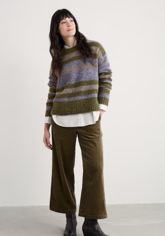 Seasalt Painter Striped Jumper Contains Mohair Carvannel Laurel Mix seasalt clothing womens striped warm jumper Person wearing a striped sweater and wide-leg pants against a plain background