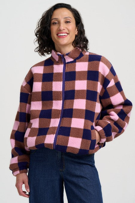 Sugarhill Brighton Hartley Zip Up Fleece Navy/Pink Check. Womens checked fleece with Longer sleeves and Stretch cuffs and Drawstring hem to adjust the fit. Including Pockets with Funnel neck and Zip front that's Machine washable (delicate). Material: 100% Recycled Polyester