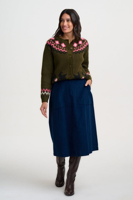 Sugarhill Brighton Olana Cardigan Olive Goat Meadow Fairisle. Womens Soft knitted fabric cardigan with Round neckline, button down front and Fairisle yoke and goat motif detail. With Ribbed cuffs and hem and Relaxed, classic silhouette. Machine washable (delicate) Material: 48% Polyester, 33% Acrylic, 14% Nylon, 3% Elastane & 2% Wool 