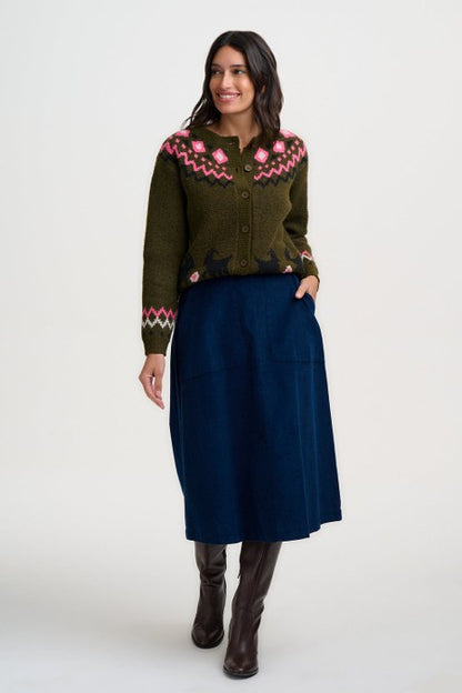 Sugarhill Brighton Olana Cardigan Olive Goat Meadow Fairisle. Womens Soft knitted fabric cardigan with Round neckline, button down front and Fairisle yoke and goat motif detail. With Ribbed cuffs and hem and Relaxed, classic silhouette. Machine washable (delicate) Material: 48% Polyester, 33% Acrylic, 14% Nylon, 3% Elastane & 2% Wool 