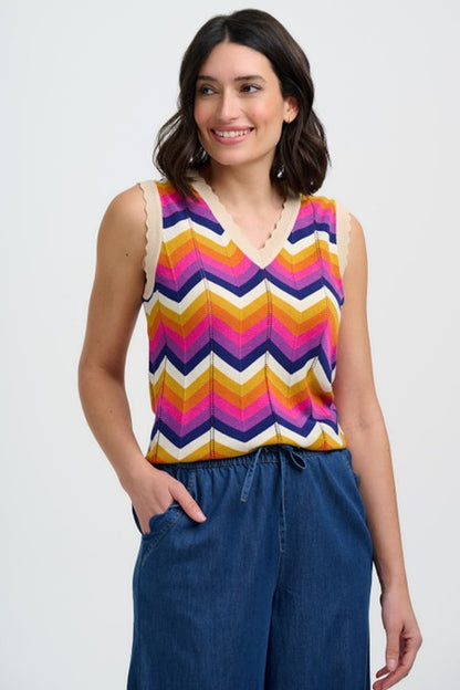 Sugarhill Clothing Brighton Rosy V-Neck Knit Vest Sunset Chevron. Womens V-neck, Sleeveless, Scalloped hems, Horizontal Pointelle lines and Machine washable (delicate) Material: 62% Viscose & 38% Cotton Description: Embrace vintage charm with the Sugarhill Brighton Rosy V-Neck Knit Vest,