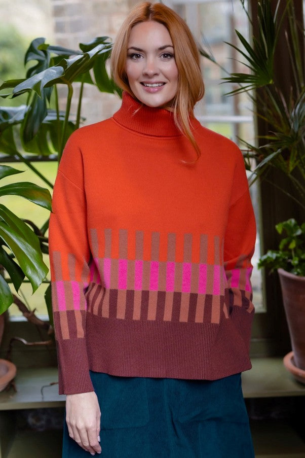 Sugarhill Brighton Serita Roll Neck Jumper Orange Section Stripes. Womens Soft knitted fabric Roll neck top with Long sleeves with ribbed cuffs. Machine washable (delicate) Material: 51% Viscose, 30% Polyester & 19% Nylon