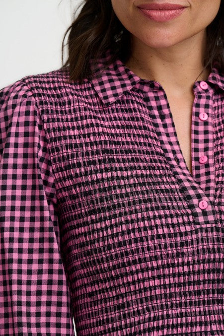 Sugarhill Diana Shirred Midi Dress Rose Gingham. Womens Lightweight woven fabric with Collared neckline with half-button placket and Smocked, fitted bodice that's Long sleeves with elasticated cuffs and Full, gathered midi skirt that's Machine Washable (Delicate) Colour: Rose Gingham Material: 100% LENZING™ ECOVERO™ Viscose
