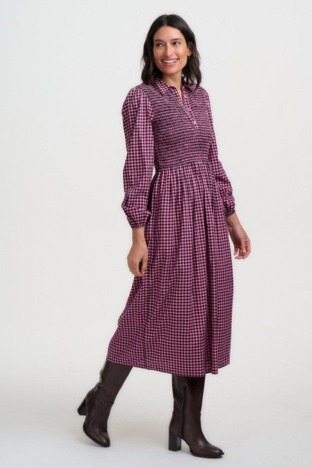 Sugarhill Diana Shirred Midi Dress Rose Gingham. Womens Lightweight woven fabric with Collared neckline with half-button placket and Smocked, fitted bodice that's Long sleeves with elasticated cuffs and Full, gathered midi skirt that's Machine Washable (Delicate) Colour: Rose Gingham Material: 100% LENZING™ ECOVERO™ Viscose