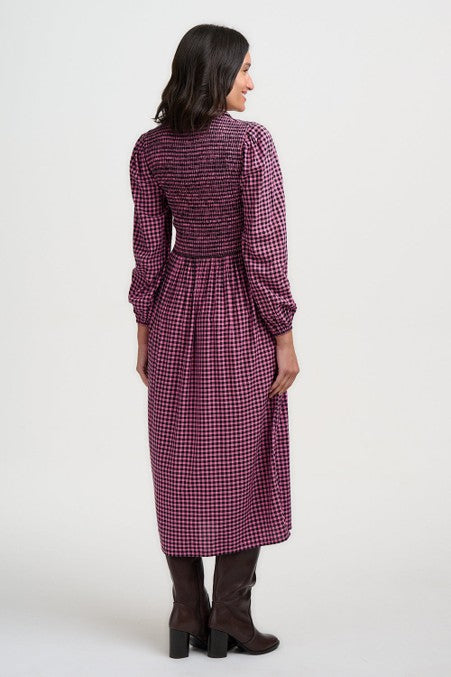 Sugarhill Diana Shirred Midi Dress Rose Gingham. Womens Lightweight woven fabric with Collared neckline with half-button placket and Smocked, fitted bodice that's Long sleeves with elasticated cuffs and Full, gathered midi skirt that's Machine Washable (Delicate) Colour: Rose Gingham Material: 100% LENZING™ ECOVERO™ Viscose
