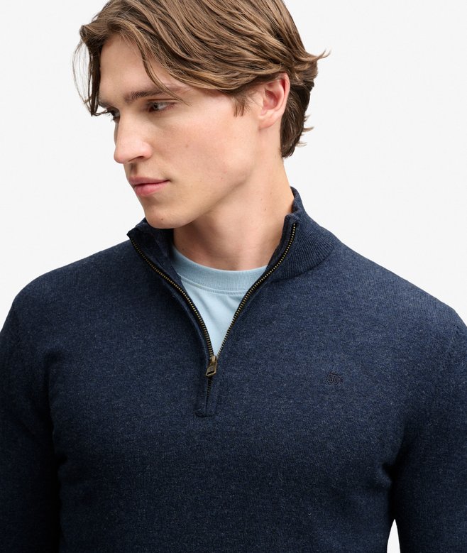 Superdry Essential Lightweight Wool Blend Half Zip Jumper Rich Navy Marl. Men's half zip that's Slim fit Wool-blend fabric with Embroidered text on the chest Material: 70% Cotton & 30% Wool