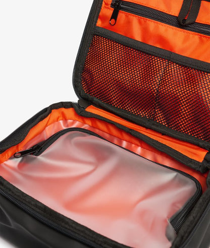 Superdry Travel Wash Bag Black. Wash bag with Top handle and Zip sealed plastic compartment with Internal zip pocket and Mesh fabric laid on pockets Material: 100% Polyester