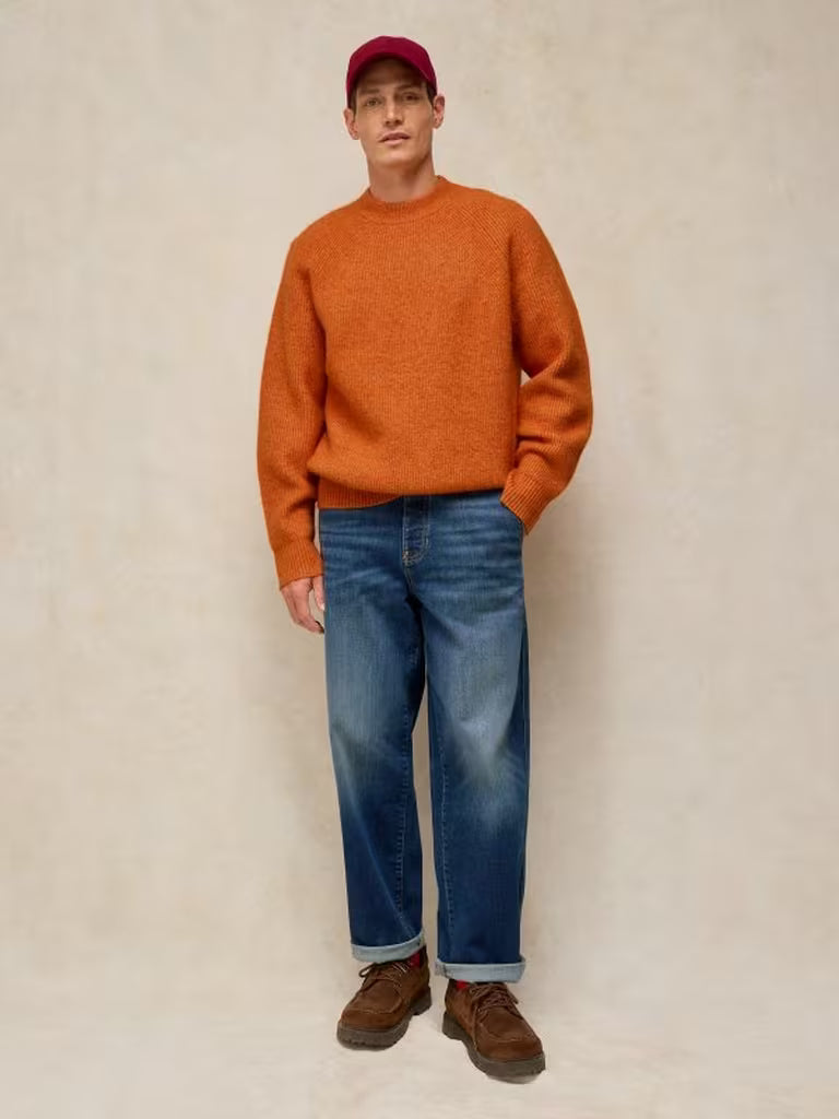 White Stuff Flint Fisherman Jumper Bright Orange. Men's Crew Neck with Long Sleeve and a Classic Fit that's Machine Washable. Material: 54% Recycled Polyester, 38% Acrylic, 5% Wool & 3% Elastane