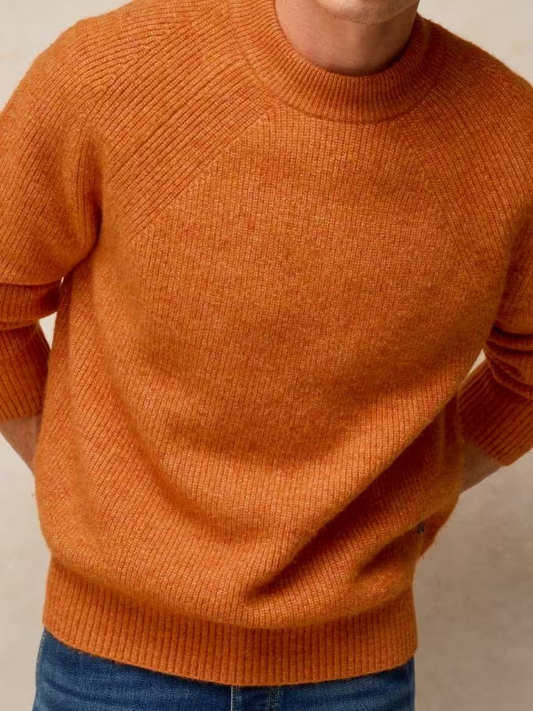 White Stuff Flint Fisherman Jumper Bright Orange. Men's Crew Neck with Long Sleeve and a Classic Fit that's Machine Washable. Material: 54% Recycled Polyester, 38% Acrylic, 5% Wool & 3% Elastane