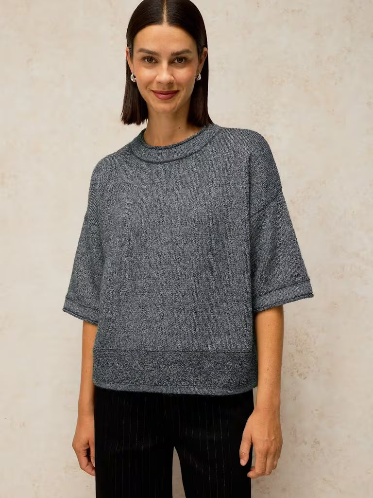 White Stuff Kate Sparkle Tee Dark Grey. Womens top with Crew Neck and Long Sleeve that's Regular fit and Machine Washable. Material: 76% Recycled Polyester, 10% Nylon, 8% Metallised Fibre, 4% Wool & 2% Elastane Style Code: 447677