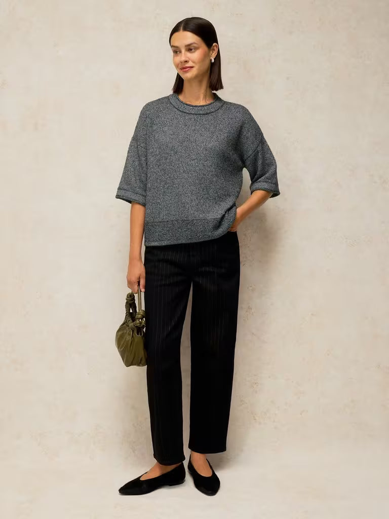 White Stuff Kate Sparkle Tee Dark Grey. Womens top with Crew Neck and Long Sleeve that's Regular fit and Machine Washable. Material: 76% Recycled Polyester, 10% Nylon, 8% Metallised Fibre, 4% Wool & 2% Elastane Style Code: 447677
