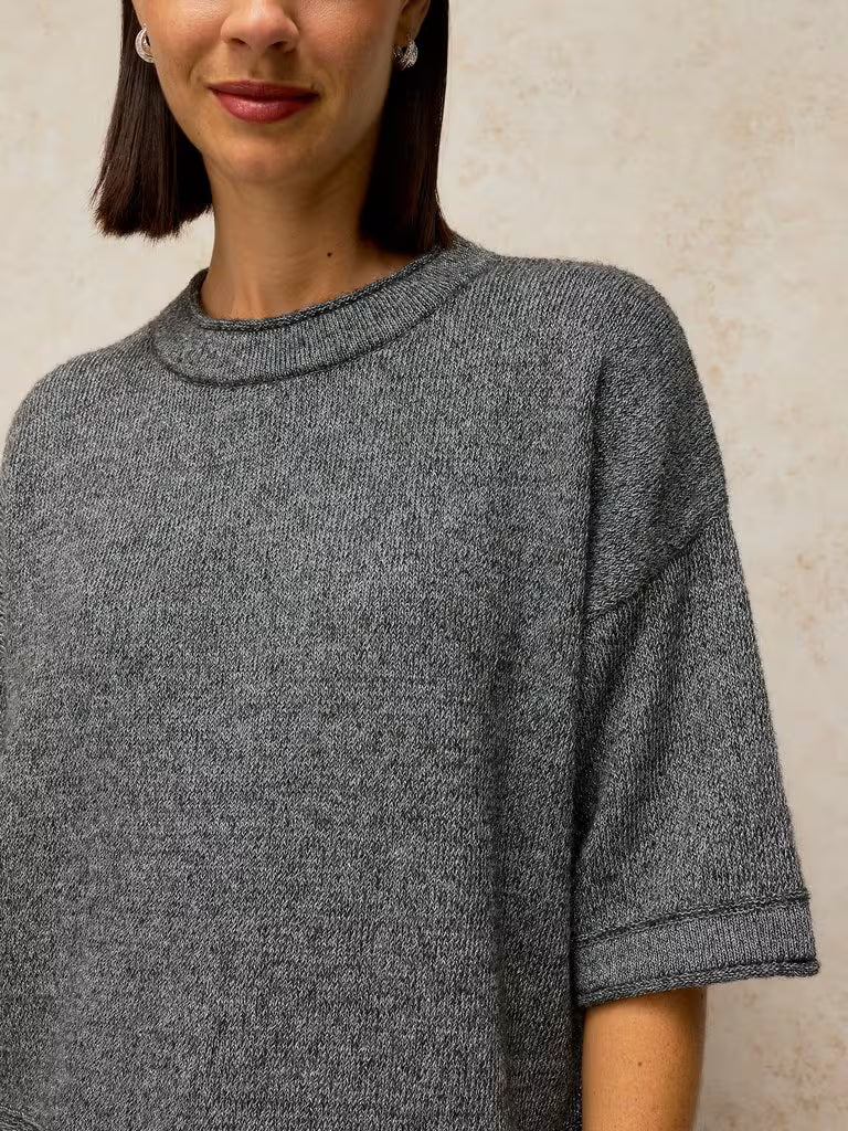 White Stuff Kate Sparkle Tee Dark Grey. Womens top with Crew Neck and Long Sleeve that's Regular fit and Machine Washable. Material: 76% Recycled Polyester, 10% Nylon, 8% Metallised Fibre, 4% Wool & 2% Elastane Style Code: 447677