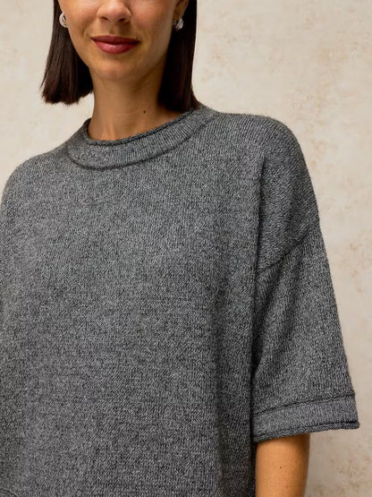 White Stuff Kate Sparkle Tee Dark Grey. Womens top with Crew Neck and Long Sleeve that's Regular fit and Machine Washable. Material: 76% Recycled Polyester, 10% Nylon, 8% Metallised Fibre, 4% Wool & 2% Elastane Style Code: 447677
