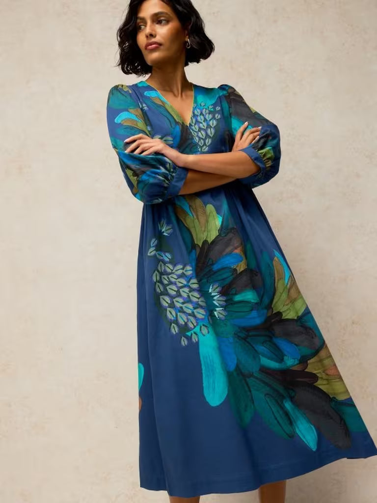 White Stuff Lucy Dress Teal Print. Womens dress with V Neck and 3/4 Sleeve that can be Machine Washable. Material: 52% Organic Cotton & 48% Viscose (LENZING ™ ECOVERO ™) 