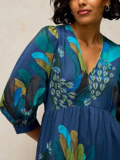 White Stuff Lucy Dress Teal Print. Womens dress with V Neck and 3/4 Sleeve that can be Machine Washable. Material: 52% Organic Cotton & 48% Viscose (LENZING ™ ECOVERO ™) 
