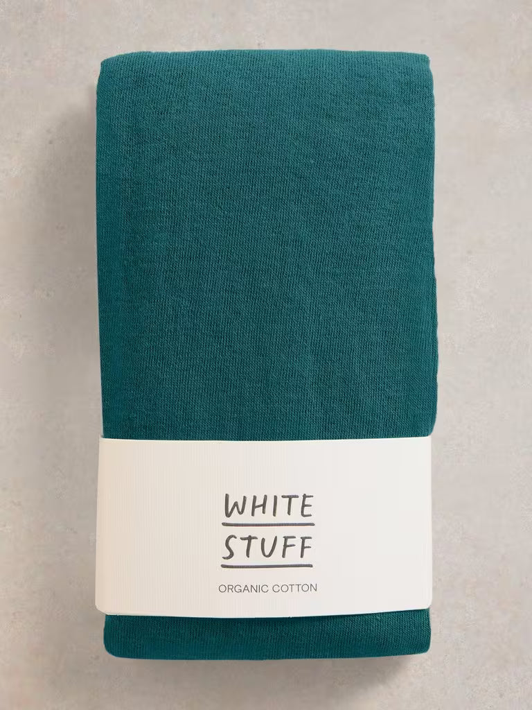 Comfortable and versatile White Stuff Patty cotton tights in dk teal. Made with 77% organic cotton for all-day comfort. Ideal for the British weather.