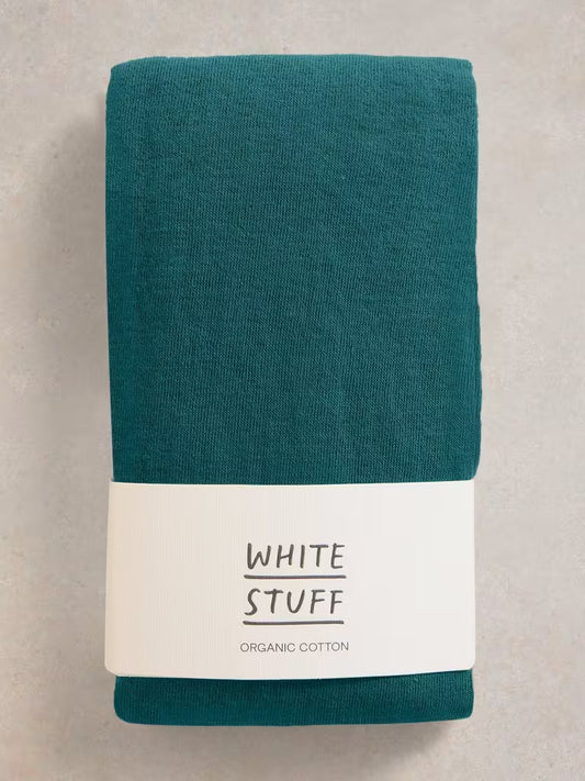Comfortable and versatile White Stuff Patty cotton tights in dk teal. Made with 77% organic cotton for all-day comfort. Ideal for the British weather.