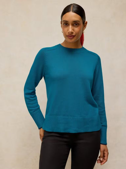 White Stuff Sienna Jumper Mid Teal . Womens Crew Neck jumper with Long Sleeve in a Regular Fit that's Machine Washable. Material: 55% Organic Cotton, 30% Modal (TENCEL™) & 15% Polyester Style Code: 446713