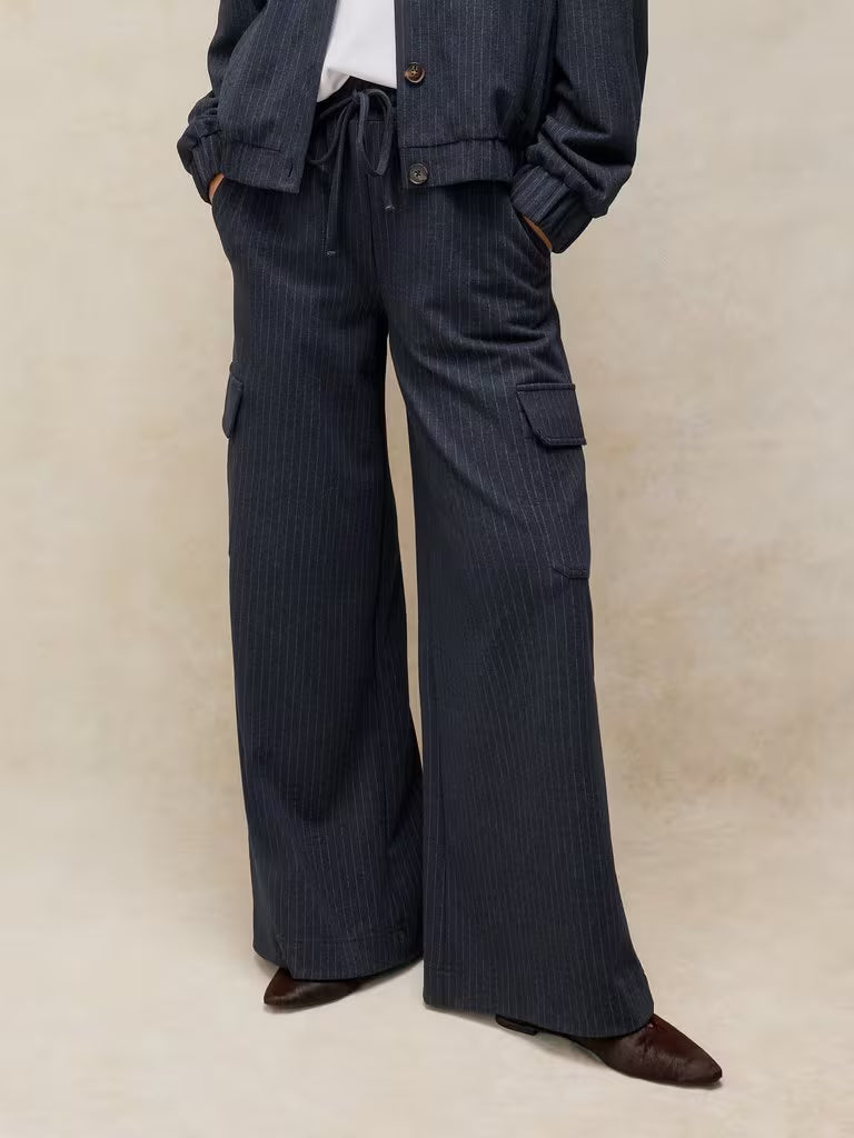 White Stuff Teagan Stripe Wide Leg Trouser Navy Multi. Womens Wide Leg trouser that's Machine Washable Material: 73% Recycled Polyester, 26% Livaeco Viscose, 1% Elastane 