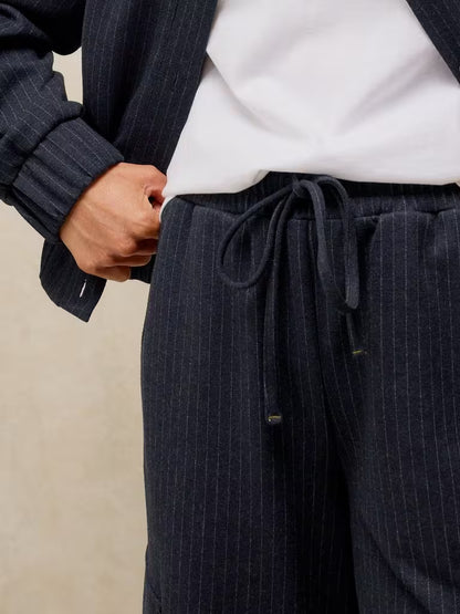 White Stuff Teagan Stripe Wide Leg Trouser Navy Multi. Womens Wide Leg trouser that's Machine Washable Material: 73% Recycled Polyester, 26% Livaeco Viscose, 1% Elastane 