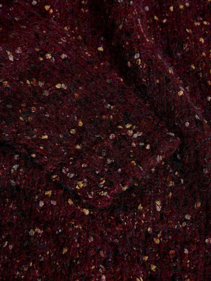 White Stuff Texture V Neck Jumper Dark Plum. Womens V Neck jumper with Long Sleeve that's Regular Fit and Machine Washable. Material: 77% Recycled Polyester, 17% Acrylic & 6% Wool 