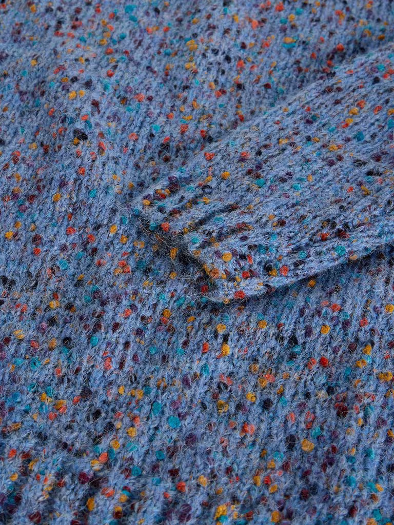 White Stuff Texture V Neck Jumper Mid Blue. Womens V Neck jumper with Long Sleeve that's Regular Fit and Machine Washable. Material: 77% Recycled Polyester, 17% Acrylic & 6% Wool 